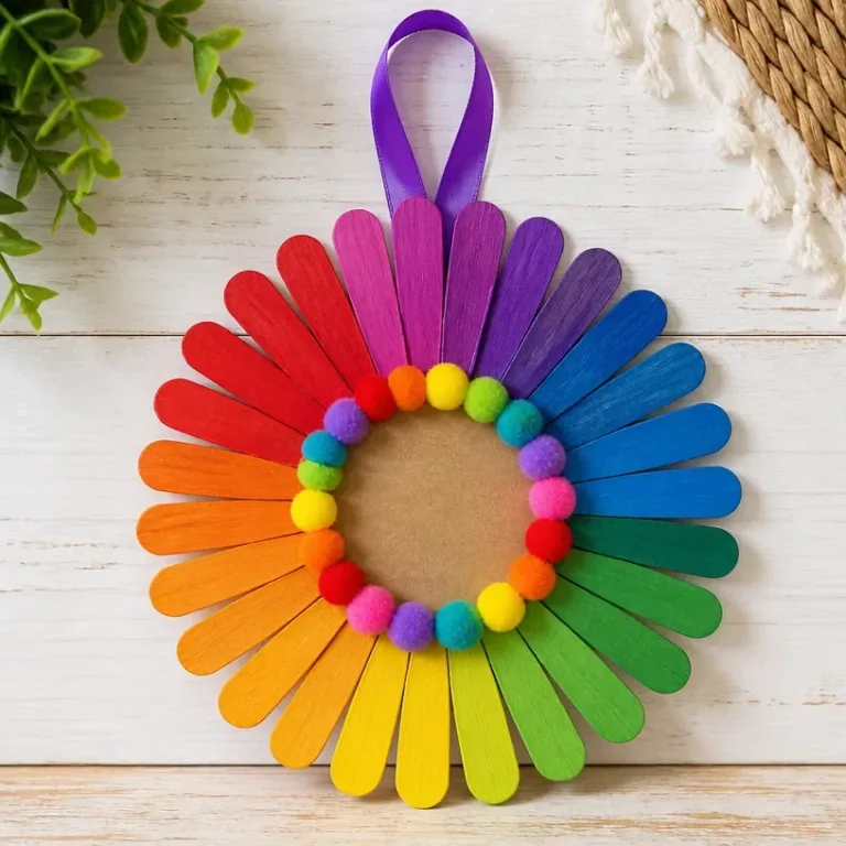 Colorful daisy wheel craft made from popsicle sticks for kids' art projects