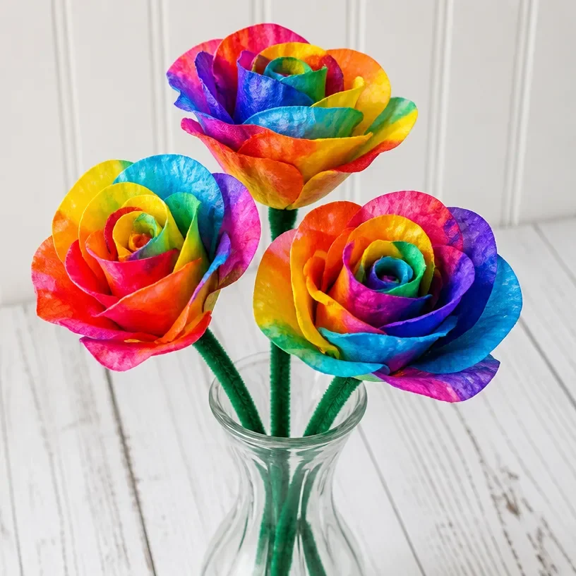 Colorful rainbow roses made from coffee filters in a decorative display